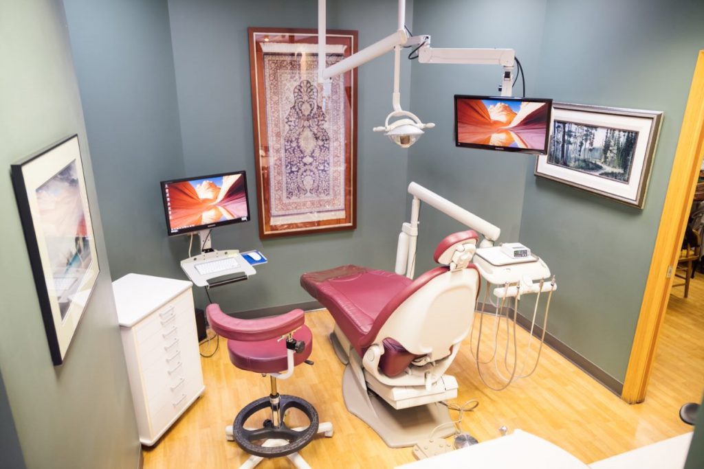 family-dental-centre-red-dental-chair-in-patient-room